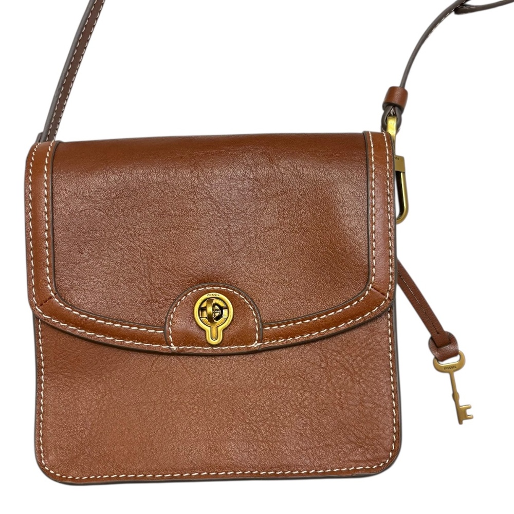 Fossil Ainsley Small Flap Crossbody bag in a brown leather